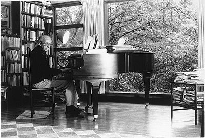Copland composing at his piano (Absolute Astronomy http://www.absoluteastronomy.com)